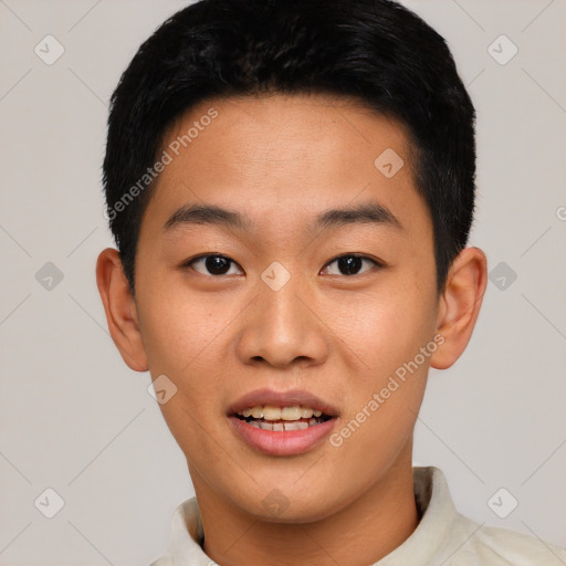Joyful asian young-adult male with short  black hair and brown eyes