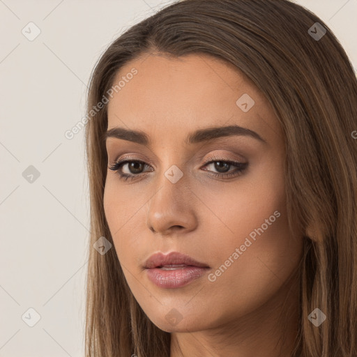 Neutral white young-adult female with long  brown hair and brown eyes