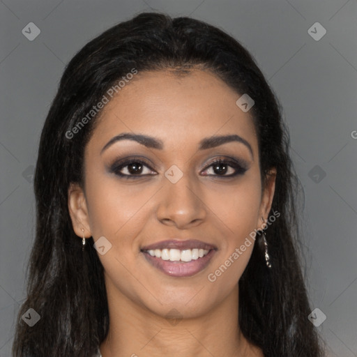 Joyful latino young-adult female with long  brown hair and brown eyes