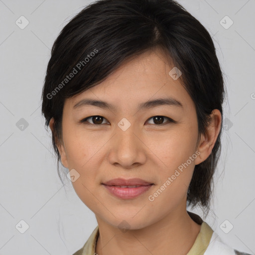 Joyful asian young-adult female with medium  brown hair and brown eyes