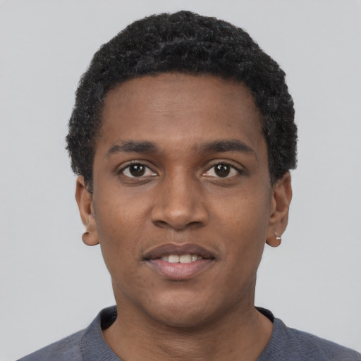 Neutral black young-adult male with short  black hair and brown eyes