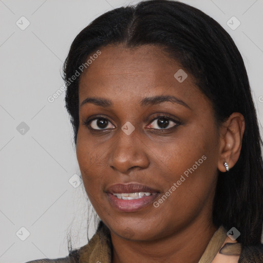 Joyful black young-adult female with medium  black hair and brown eyes