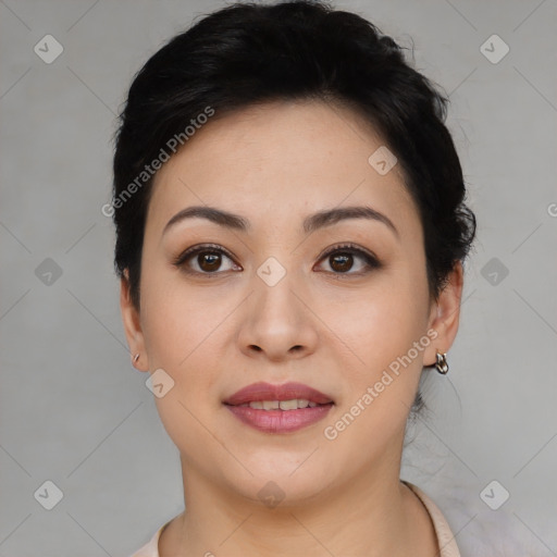 Joyful asian young-adult female with short  black hair and brown eyes