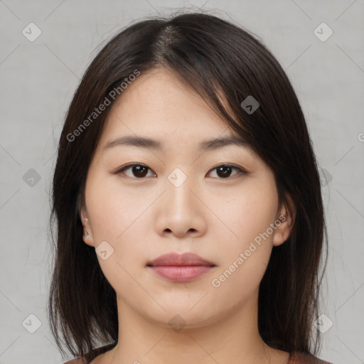 Neutral asian young-adult female with medium  brown hair and brown eyes