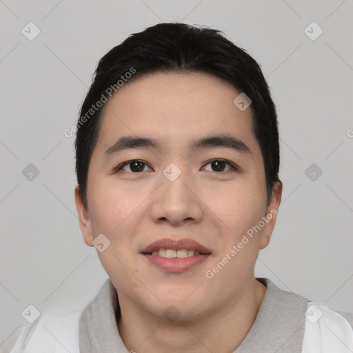 Joyful asian young-adult male with short  black hair and brown eyes