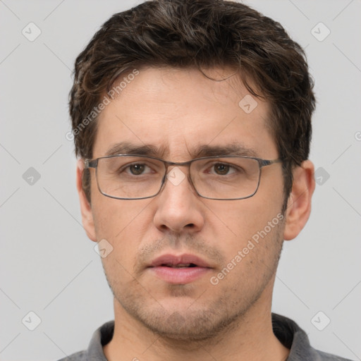 Neutral white adult male with short  brown hair and brown eyes