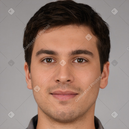 Joyful white young-adult male with short  brown hair and brown eyes