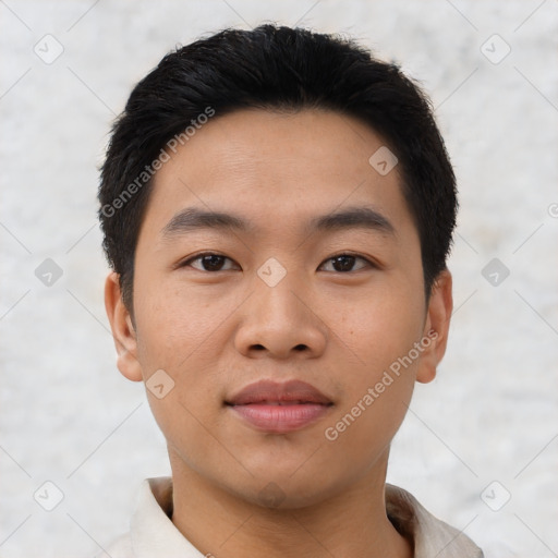 Joyful asian young-adult male with short  black hair and brown eyes