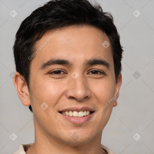 Joyful white young-adult male with short  black hair and brown eyes