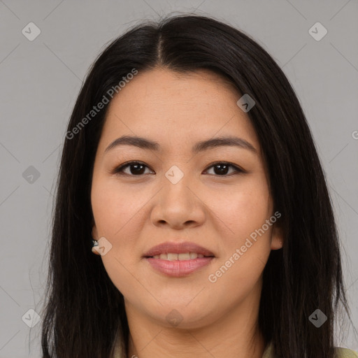 Joyful asian young-adult female with long  brown hair and brown eyes