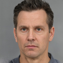 Neutral white adult male with short  brown hair and brown eyes