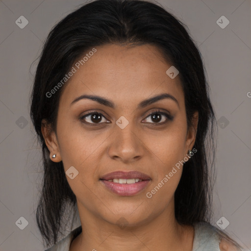 Joyful latino young-adult female with medium  brown hair and brown eyes