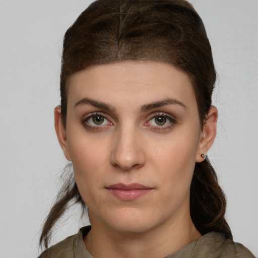 Neutral white young-adult female with medium  brown hair and brown eyes