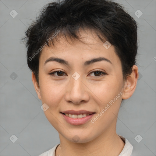 Joyful asian young-adult female with short  brown hair and brown eyes