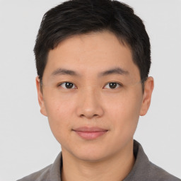 Neutral asian young-adult male with short  brown hair and brown eyes