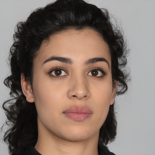 Neutral latino young-adult female with long  black hair and brown eyes