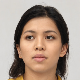 Neutral asian young-adult female with medium  brown hair and brown eyes