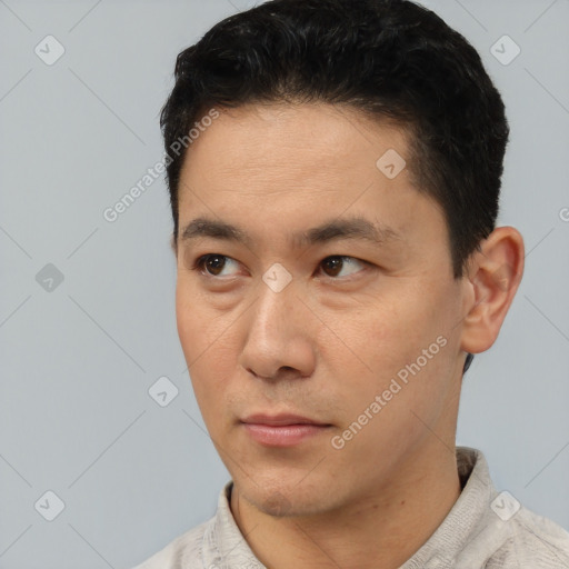 Neutral asian young-adult male with short  black hair and brown eyes