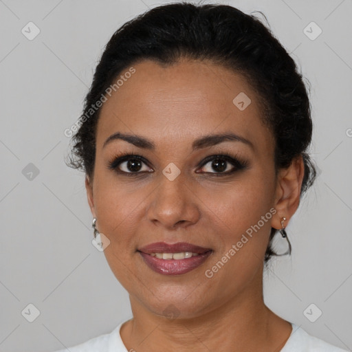 Joyful latino young-adult female with medium  brown hair and brown eyes