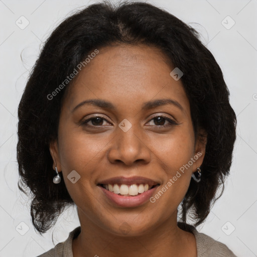 Joyful black young-adult female with medium  brown hair and brown eyes