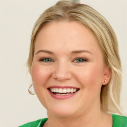 Joyful white young-adult female with medium  brown hair and green eyes