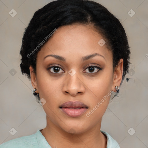 Joyful black young-adult female with short  black hair and brown eyes