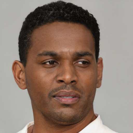 Neutral black young-adult male with short  brown hair and brown eyes