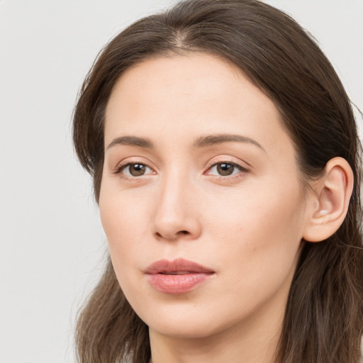 Neutral white young-adult female with long  brown hair and grey eyes