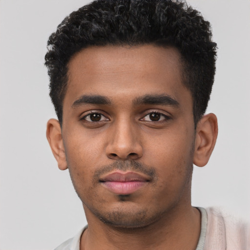 Neutral black young-adult male with short  black hair and brown eyes