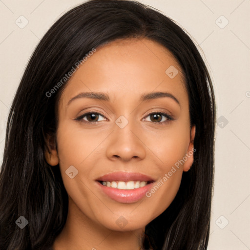 Joyful white young-adult female with long  black hair and brown eyes