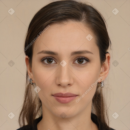 Neutral white young-adult female with long  brown hair and brown eyes