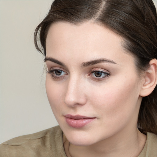 Neutral white young-adult female with medium  brown hair and grey eyes