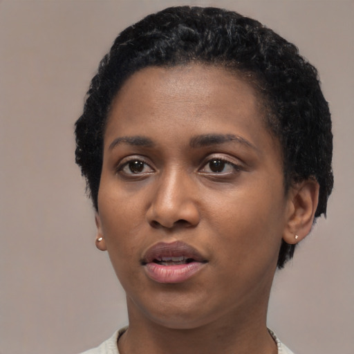 Neutral black young-adult female with short  black hair and brown eyes