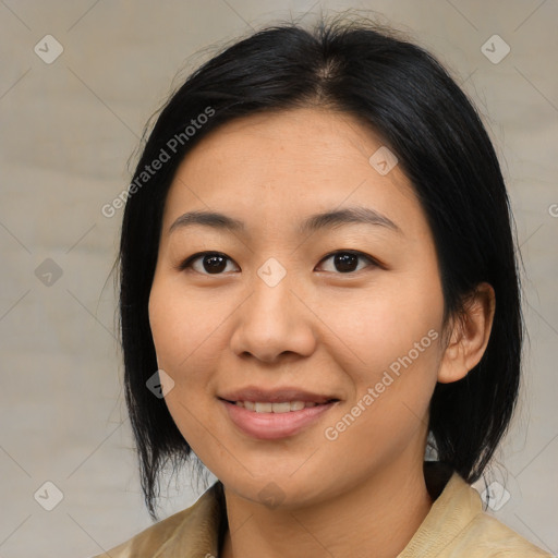 Joyful asian young-adult female with medium  black hair and brown eyes