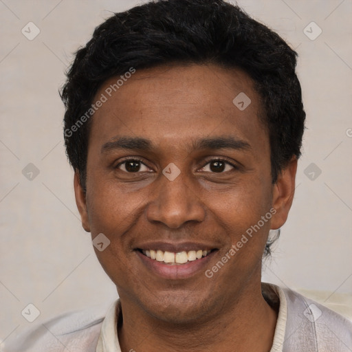 Joyful latino young-adult male with short  black hair and brown eyes