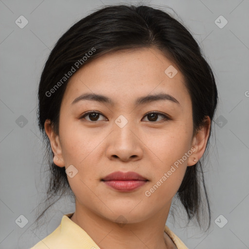 Joyful asian young-adult female with medium  brown hair and brown eyes