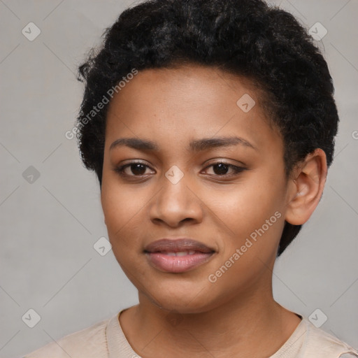 Joyful black young-adult female with short  black hair and brown eyes