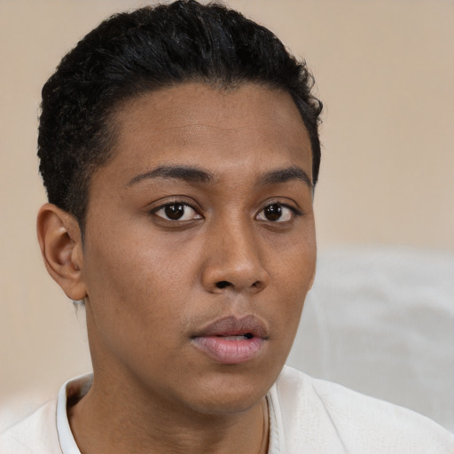 Neutral black young-adult female with short  brown hair and brown eyes