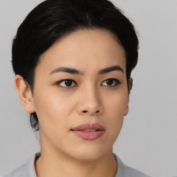 Neutral asian young-adult female with short  brown hair and brown eyes