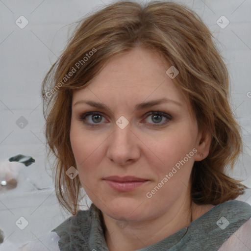 Joyful white young-adult female with medium  brown hair and blue eyes