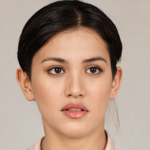 Neutral white young-adult female with short  brown hair and brown eyes