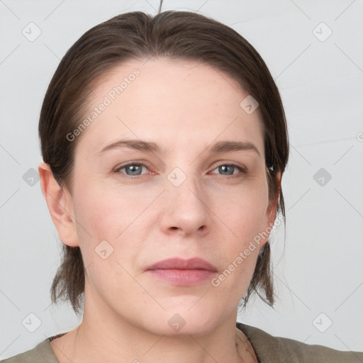 Neutral white young-adult female with medium  brown hair and grey eyes