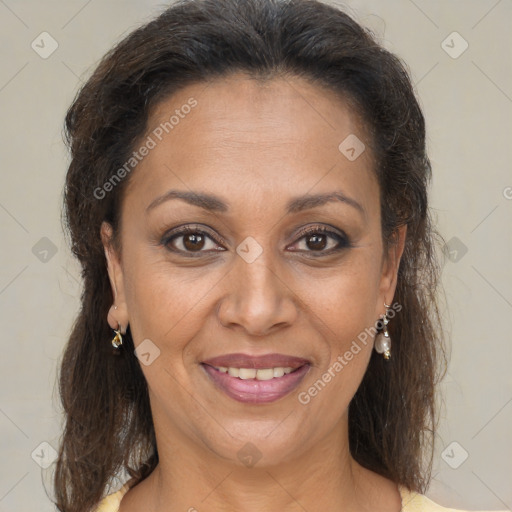 Joyful black adult female with medium  brown hair and brown eyes