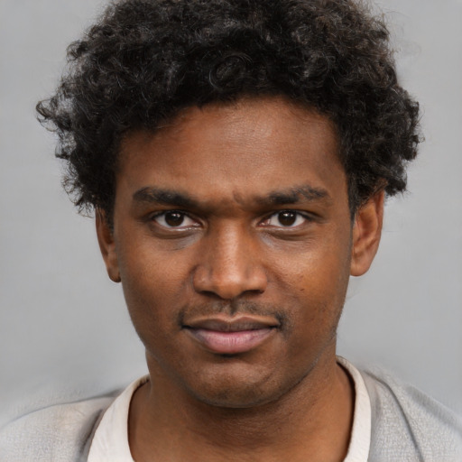 Neutral black young-adult male with short  brown hair and brown eyes