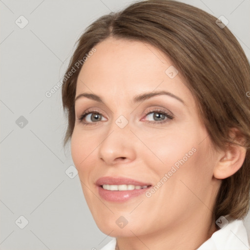 Joyful white young-adult female with medium  brown hair and green eyes