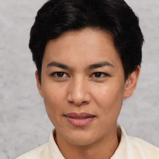 Joyful asian young-adult female with short  brown hair and brown eyes