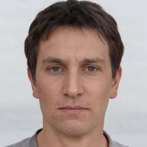 Neutral white adult male with short  brown hair and brown eyes