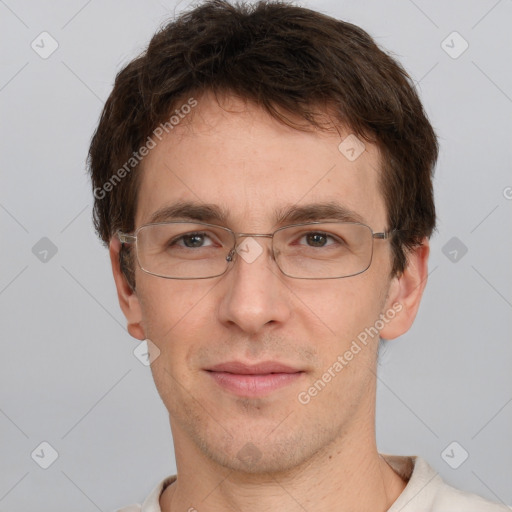 Joyful white adult male with short  brown hair and brown eyes