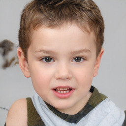 Joyful white child male with short  brown hair and brown eyes