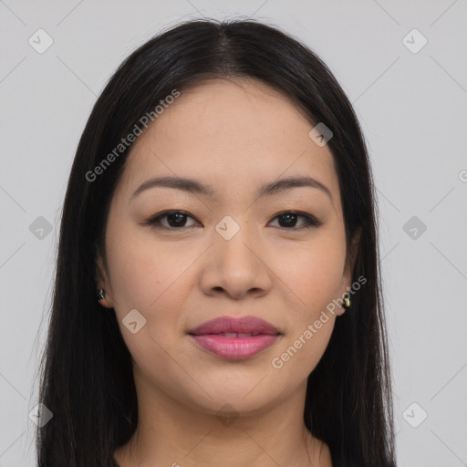 Joyful asian young-adult female with long  brown hair and brown eyes